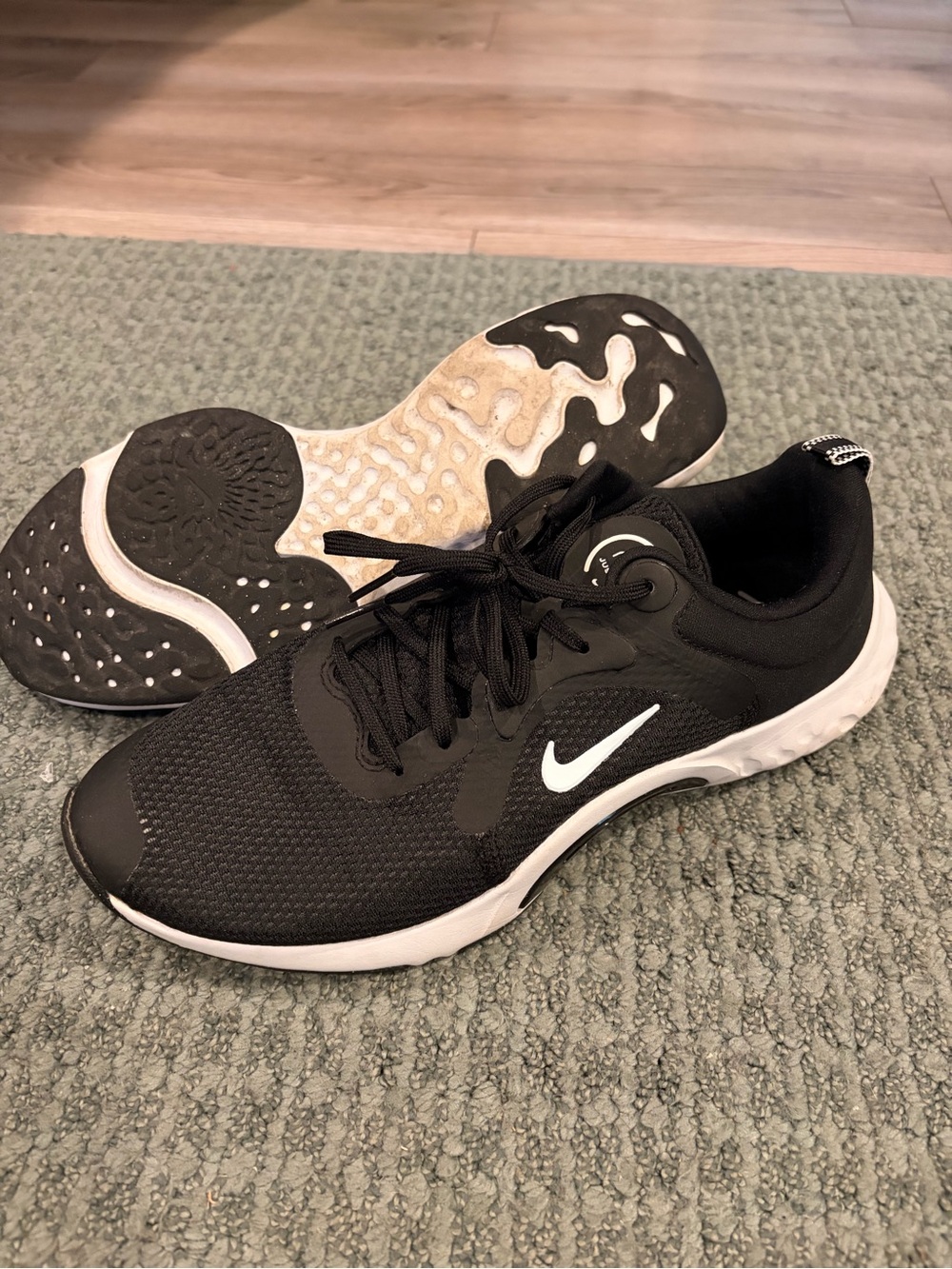 Nike women’s Black and White Training Shoe with Swoosh